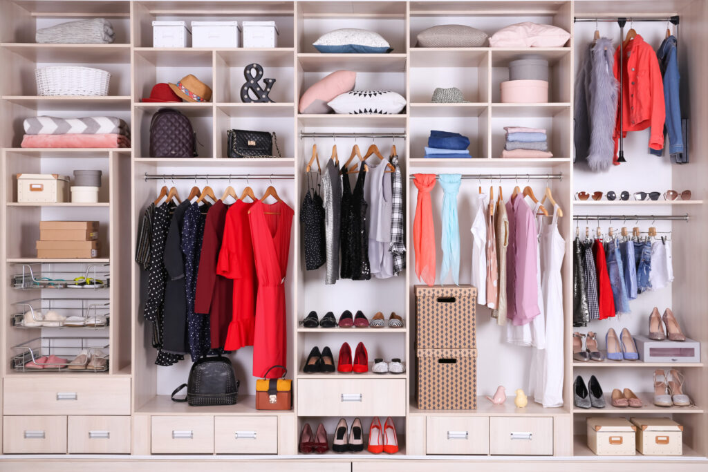 Large wardrobe with different clothes, home stuff and shoes