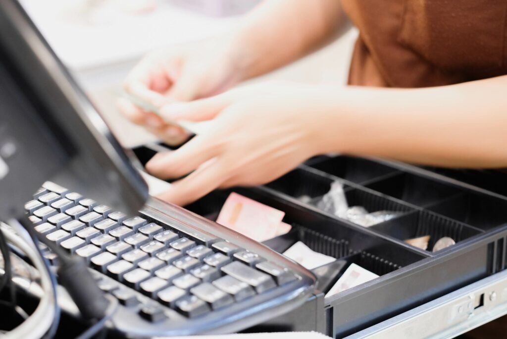 hands working on cashier hands working on cashier