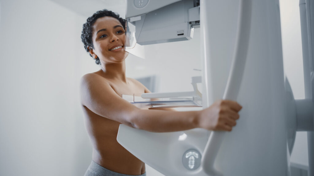 In the Hospital, Happy Smiling Topless Latin Female Patient with In the Hospital, Happy Smiling Topless Latin Female Patient with