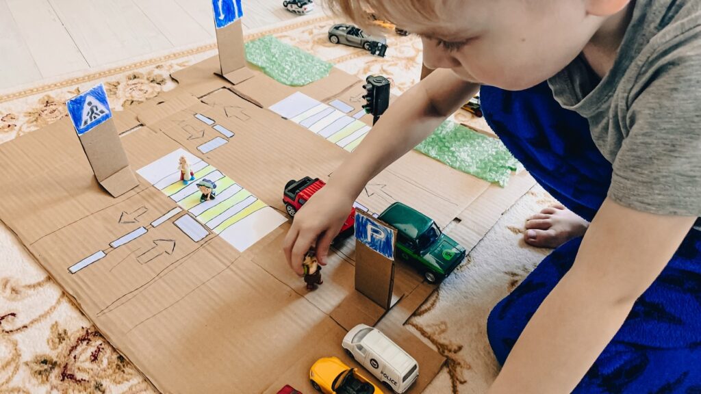 a-child-plays-a-homemade-game-made-of-cardboard-tr-2022-05-18-08-51-29-utc