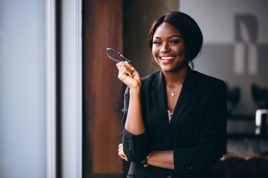 african-american-business-woman-by-the-window-min-scaled african-american-business-woman-by-the-window-min-scaled