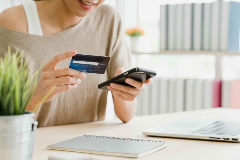 beautiful-asian-woman-using-smartphone-buying-online-shopping-min-scaled-e1647280484491
