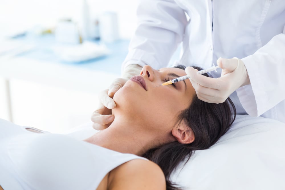 beautiful-young-woman-getting-botox-cosmetic-injection-in-her-face