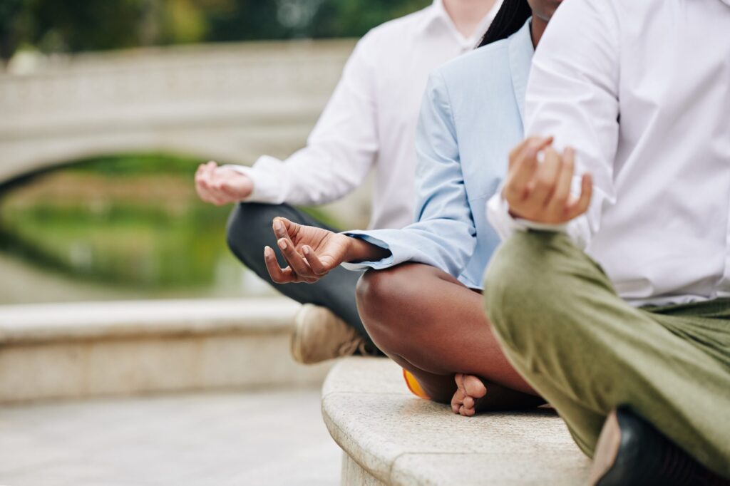 Business people meditating Business people meditating