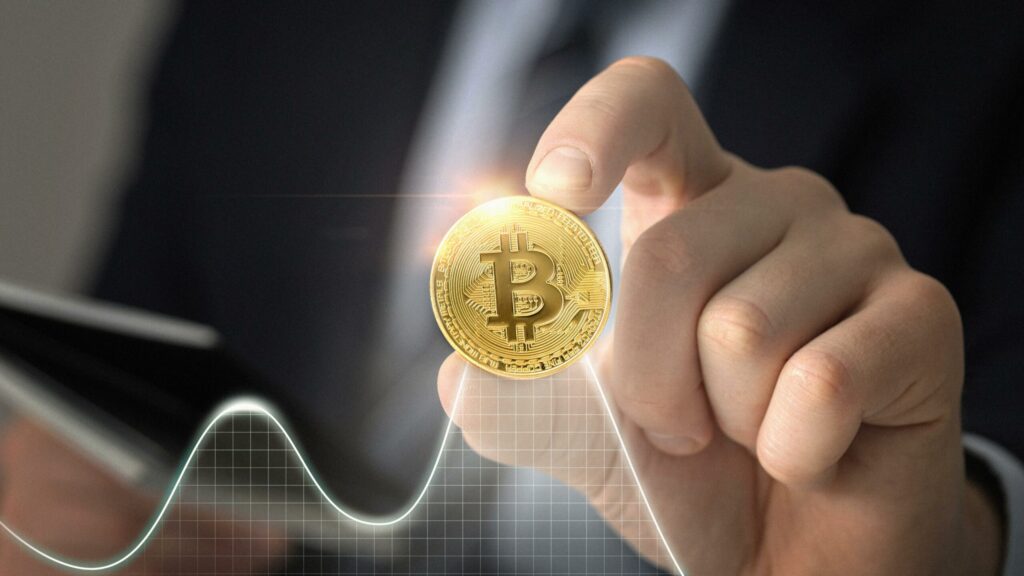 close-up-hand-holding-coin-scaled close-up-hand-holding-coin-scaled