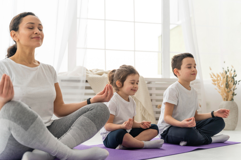 medium-shot-people-on-yoga-mat medium-shot-people-on-yoga-mat