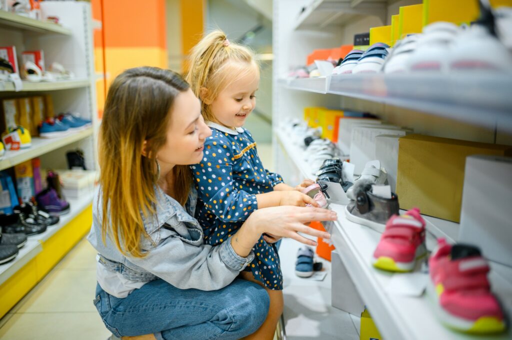 mother-and-baby-looking-on-shoes-in-kid-39-s-stor-2021-08-29-19-22-16-utc-1-scaled mother-and-baby-looking-on-shoes-in-kid-39-s-stor-2021-08-29-19-22-16-utc-1-scaled