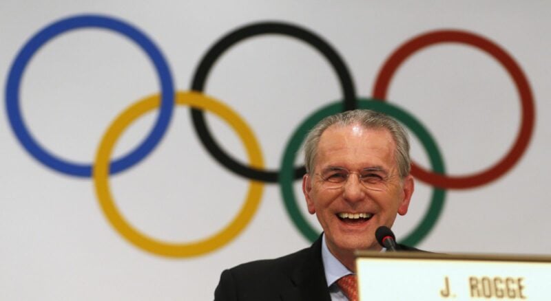 International Olympic Commitee president Rogge laughs during news conference in Buenos Aires