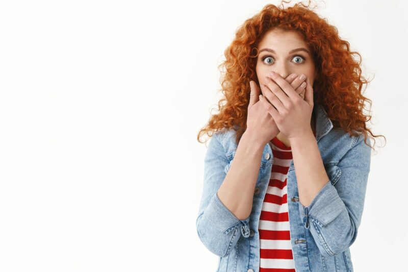 shocked-concerned-young-redhead-female-friend-reacting-shocking-terrifying-news-gasping-scared-close-mouth-hands-wide-eyes-frustrated-standing-white-wall-worry-bad-breath-min-scaled-e1644605059401 shocked-concerned-young-redhead-female-friend-reacting-shocking-terrifying-news-gasping-scared-close-mouth-hands-wide-eyes-frustrated-standing-white-wall-worry-bad-breath-min-scaled-e1644605059401