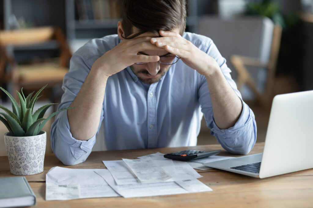 Sad,Depressed,Man,Checking,Bills,,Anxiety,About,Debt,Or,Bankruptcy,