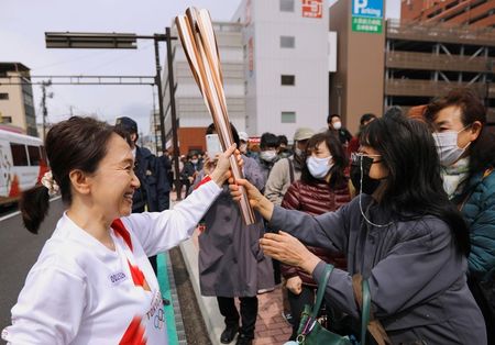 Revezamento da tocha olímpica em Fukushima, no Japão Revezamento da tocha olímpica em Fukushima, no Japão