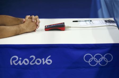 Mesa de arbitragem durante luta de boxe dos Jogos Rio 2016