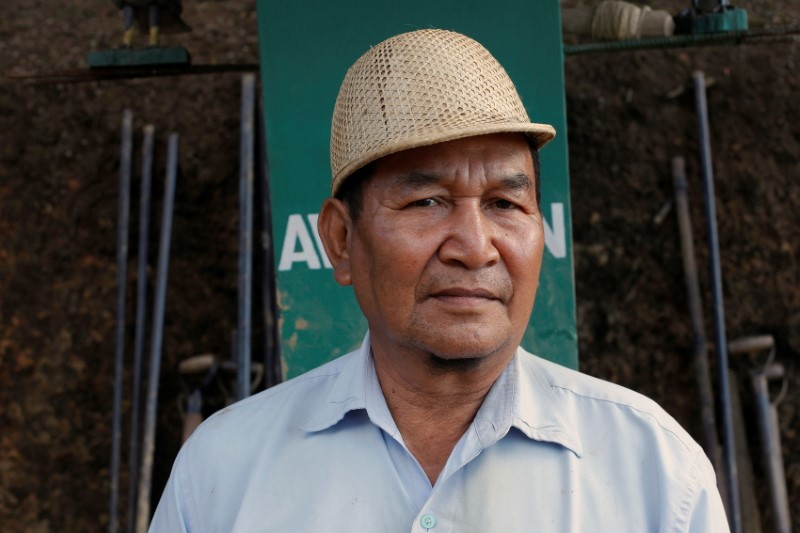 Ziona posa para foto em 2011 no vilarejo de Baktawng, na Índia