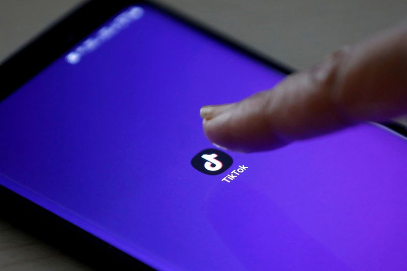FILE PHOTO: The TikTok app’s logo seen on a mobile phone screen in this picture illustration