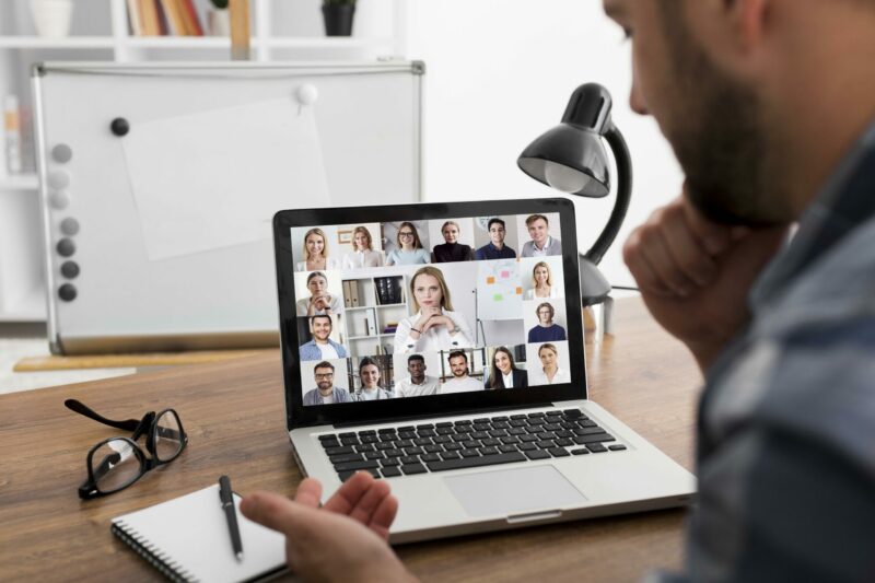 team-meeting-online-conference-call-on-laptop-scaled-e1648588179175