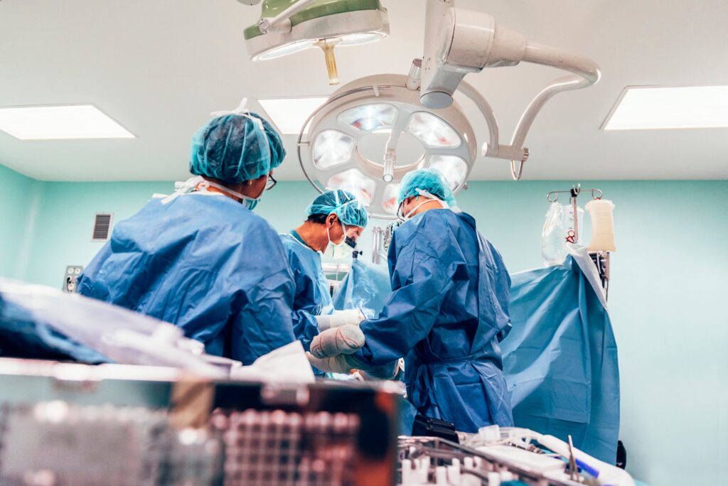 Team of Surgeons Operating.