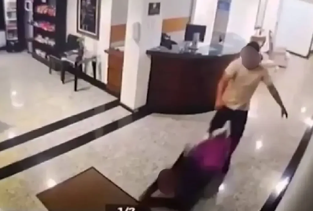Recepcionista sendo agredida no hotel